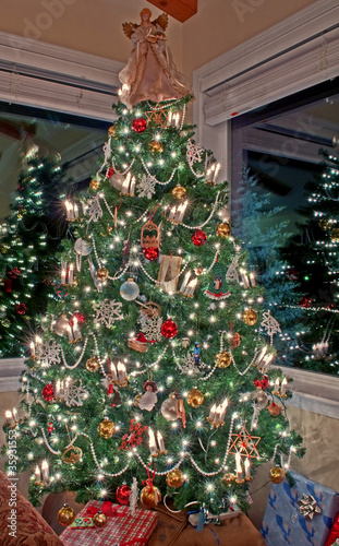 Vertical Tall Decorated Christmas Tree Indoors