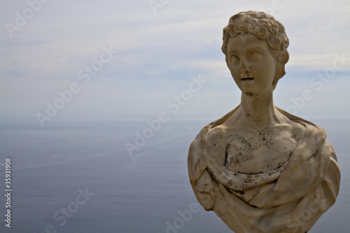 Ancient sculpture high above the sea