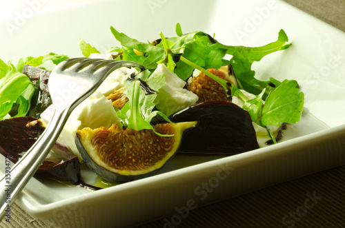 salad of fresh figs, roasted beetroot and feta with rocket photo