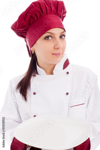 Chef Gastronomico che presenta il piatto photo