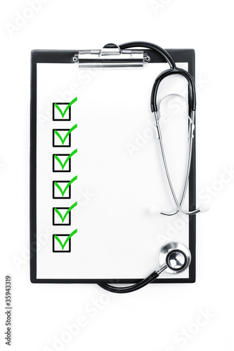 Clipboard with checklist and stethoscope isolated with path incl photo