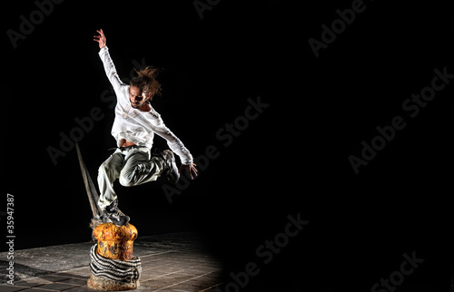 Inline skater doing tricks photo