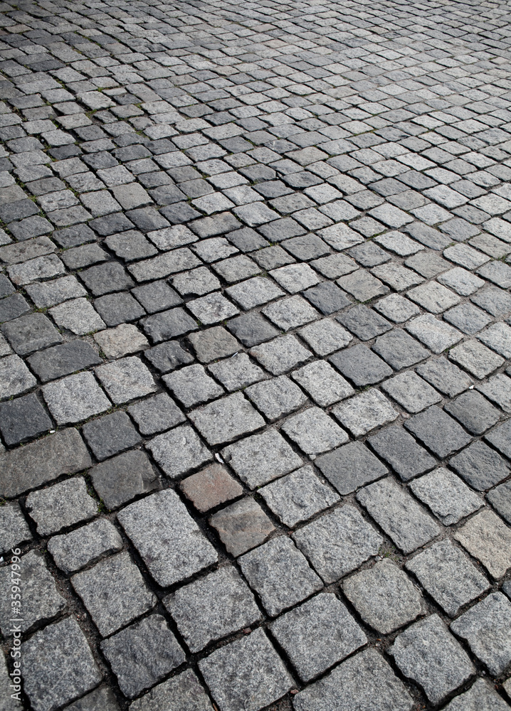 Old cobble stone street texture or background