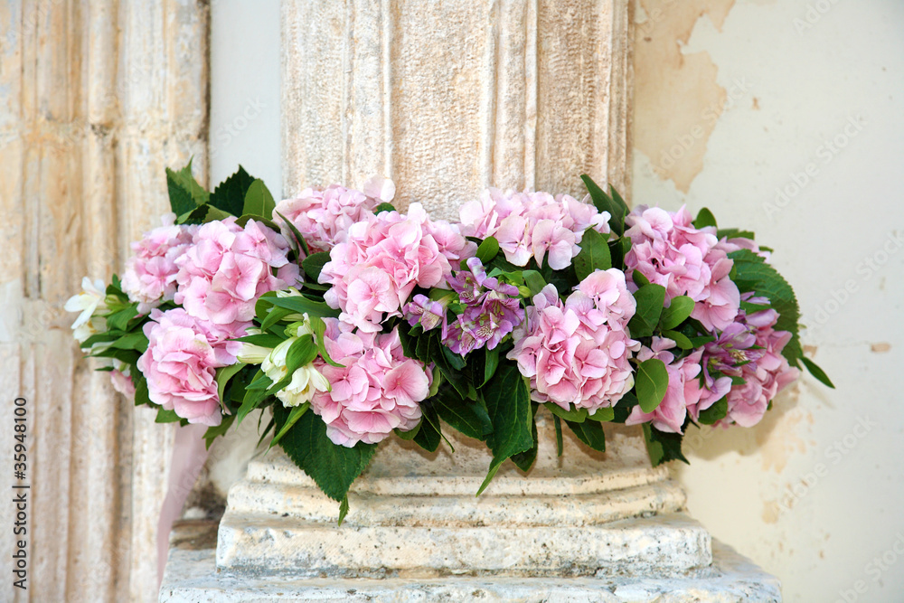 Flowers decorate a pillar