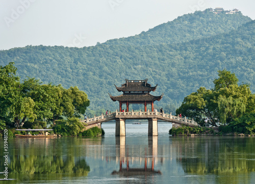 Old bridge over a lake, China
