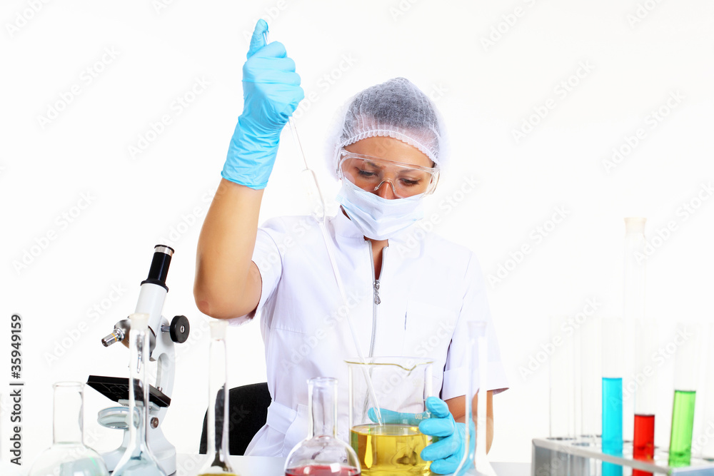Female scientist in a chemistry laboratory Female scientist in a chemistry laboratory