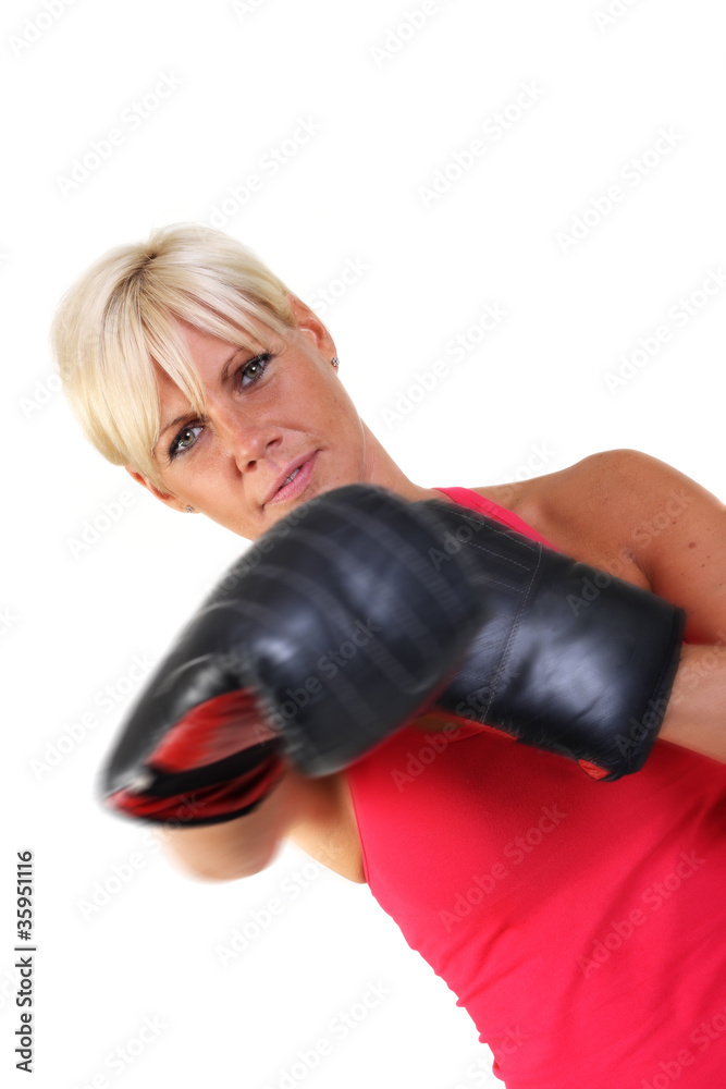 Attractive woman shadow boxing
