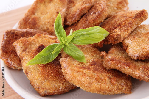 Fried Soy Meat decorated with basil