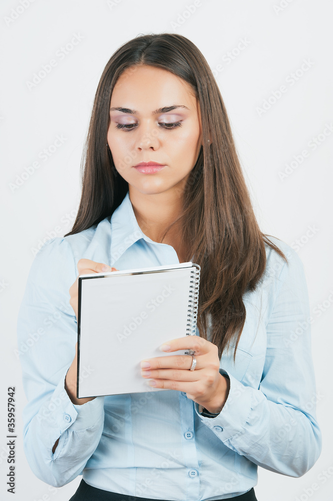businesswoman writing something on a notebook, businesswoman writing something on a notebook,
