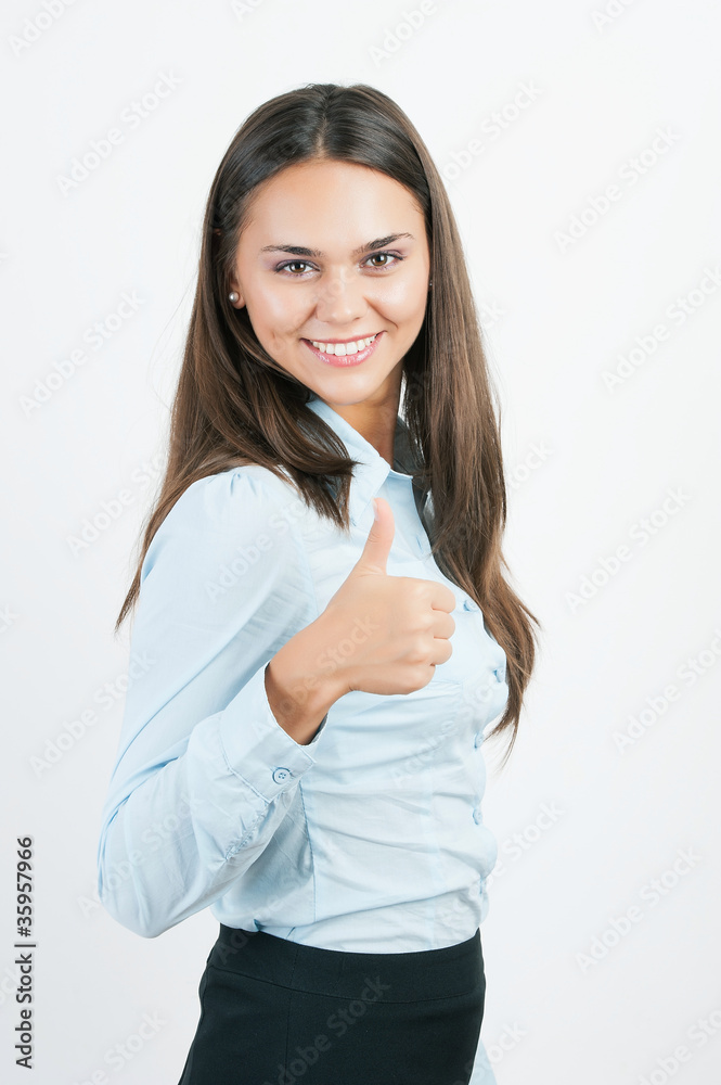 Happy smiling business woman showing thumbs up gesture Happy smiling business woman showing thumbs up gesture