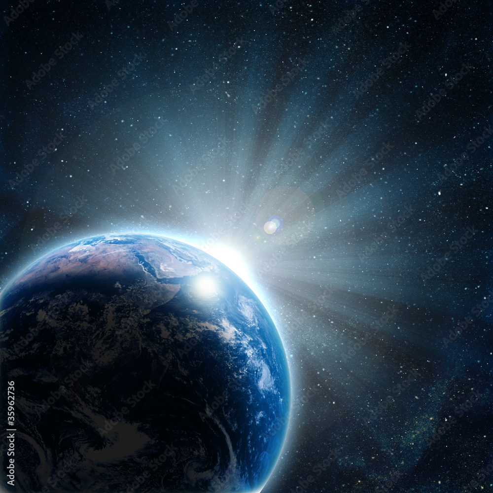 Fototapeta premium blue earth in space with rising sun