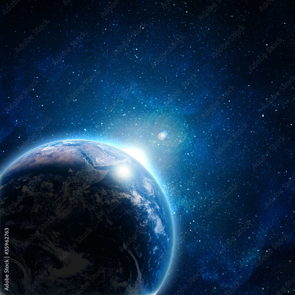 Fototapeta premium blue earth in space with rising sun