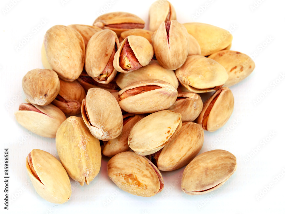 Close-up image of pistachios studio isolated on white background Close-up image of pistachios studio isolated on white background