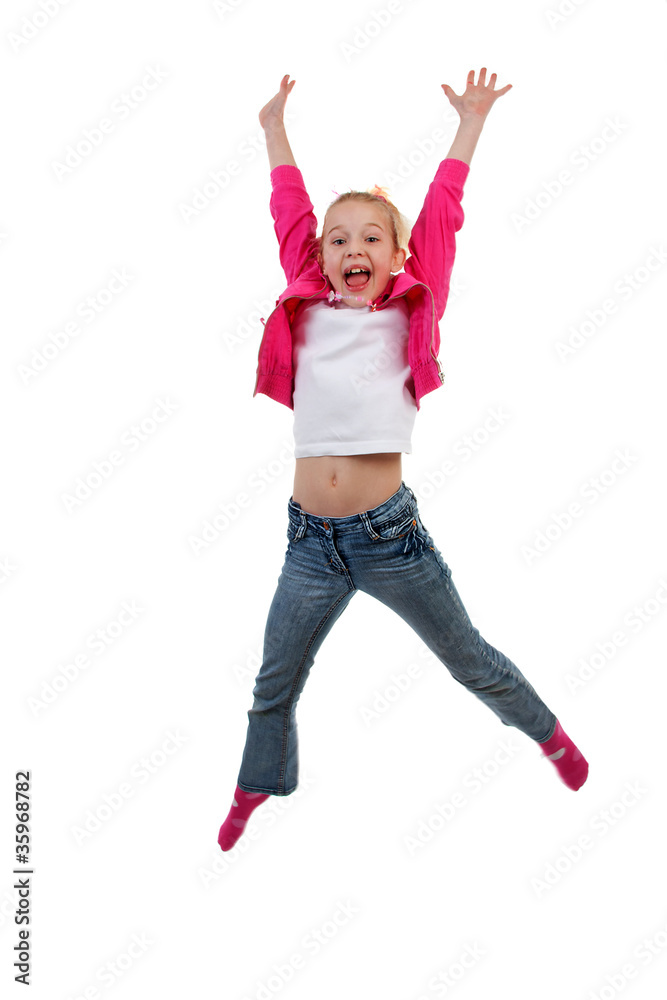 blonde girl is jumping in the air