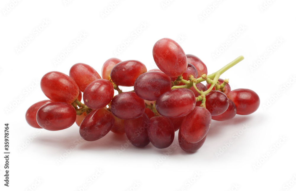 Red grapes on white background