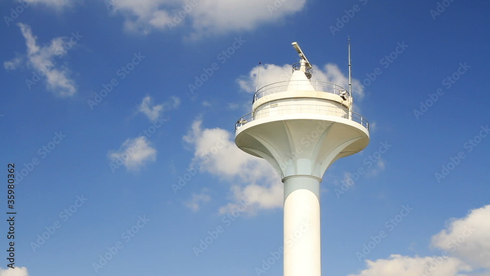 Vessel traffic radar navigation tower on a clear blue sky Vessel traffic radar navigation tower on a clear blue sky