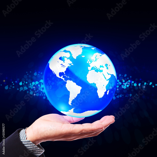Hand holding crystal globe, Save world concept