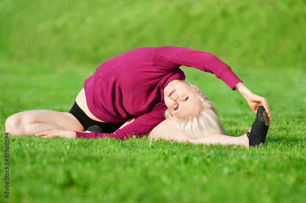 Beautiful woman doing yoga stretching exercise Beautiful woman doing yoga stretching exercise