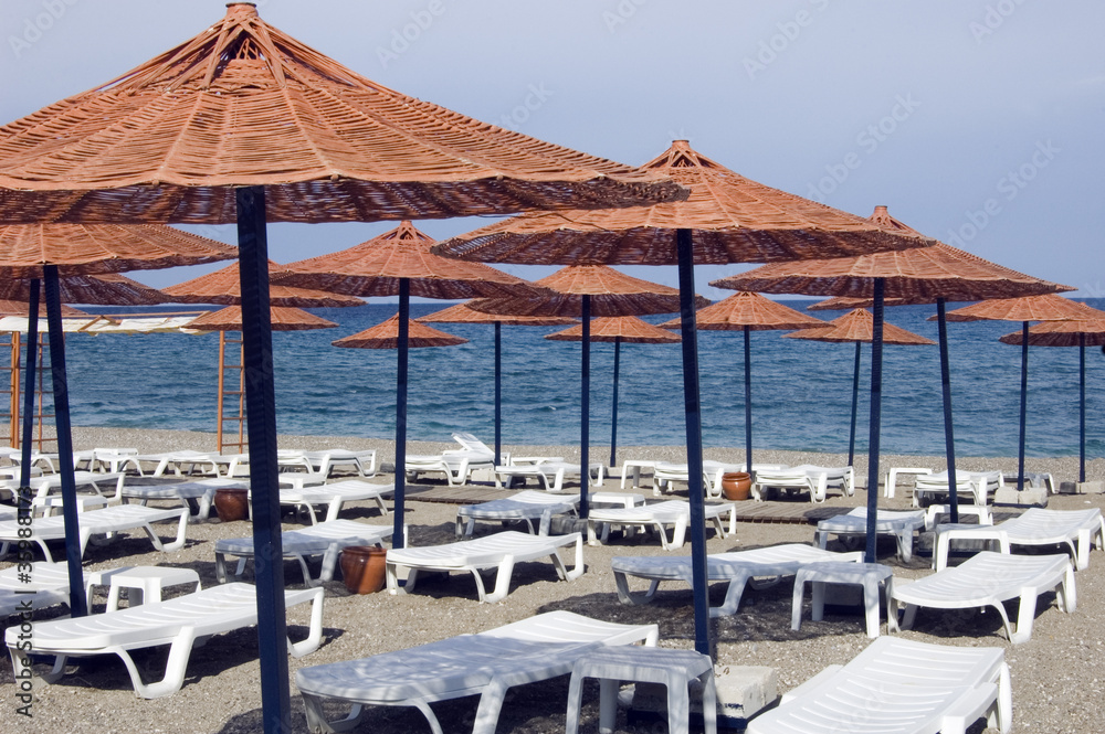 Sunbathing chairs and sun umbrellas