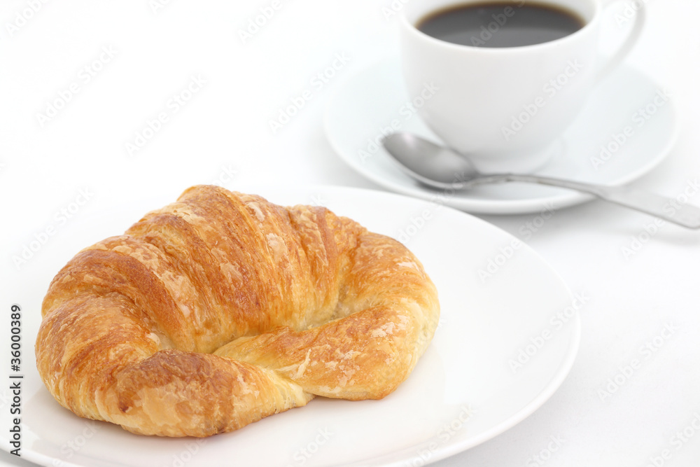 croissant with coffee isolated in white background