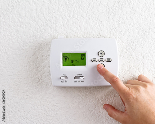 digital thermostat with finger