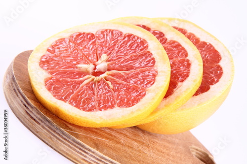 Grapefruit  a sliced half on white background