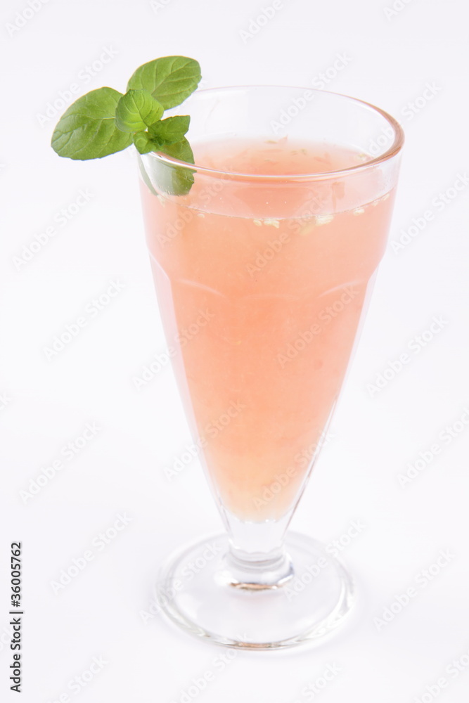 Grapefruit juice decorated with mint Grapefruit juice decorated with mint
