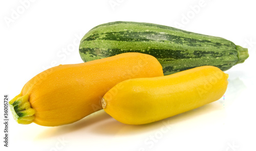 Yellow and Green zucchini isolated on white