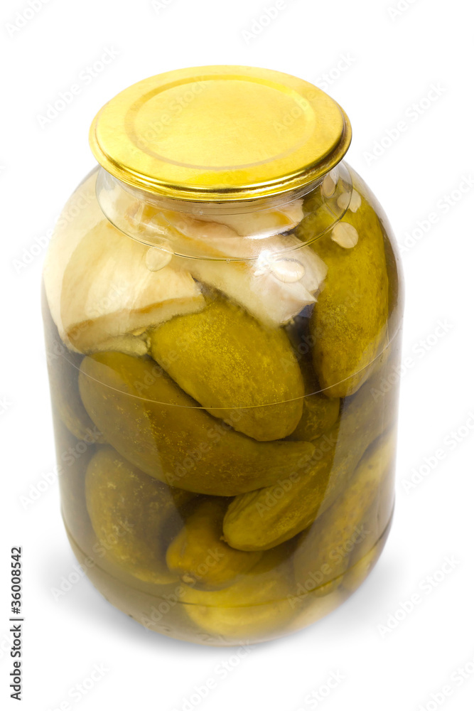 pickles in a glass jar on white background pickles in a glass jar on white background
