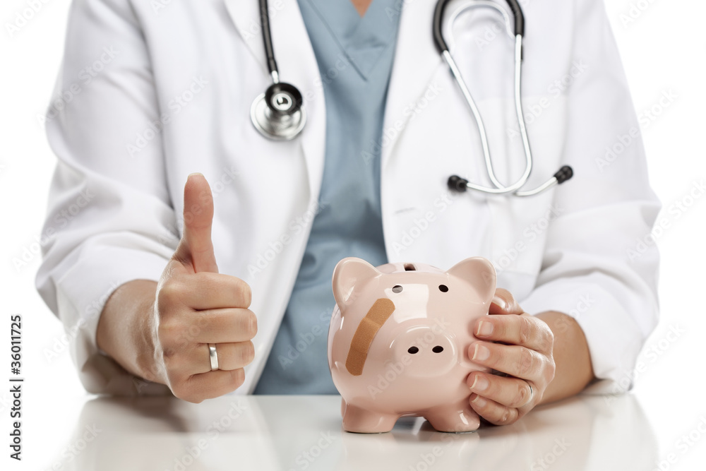 Doctor with Thumbs Up Holds Hand to Bandaged Piggy Bank Doctor with Thumbs Up Holds Hand to Bandaged Piggy Bank