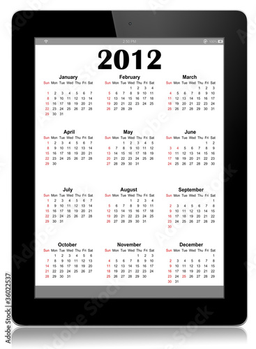 Calendar for 2012 in tablet PC on white photo