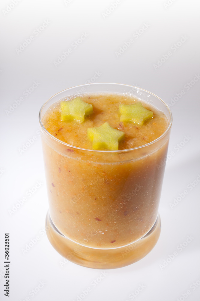 glass with blended fruits decorated with the stars glass with blended fruits decorated with the stars