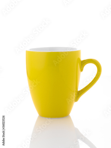 Yellow coffee cup on white background