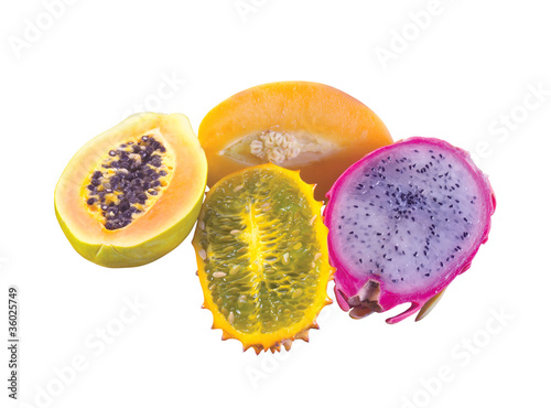 Exotic and tropical juicy fruits isolated on white background photo