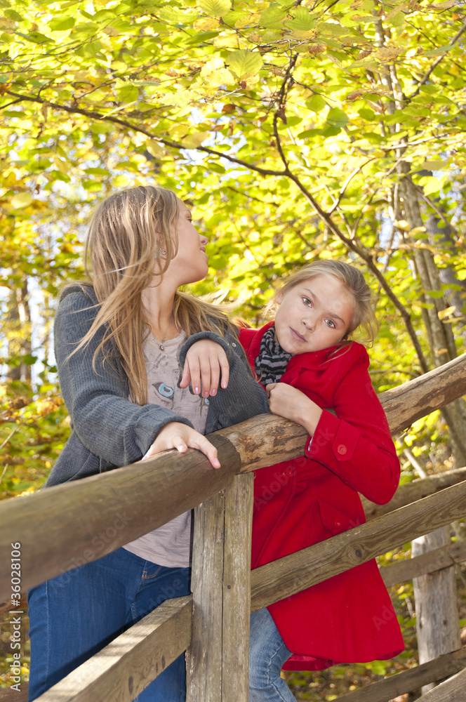 Fototapeta premium Nice girls in autumnal forest