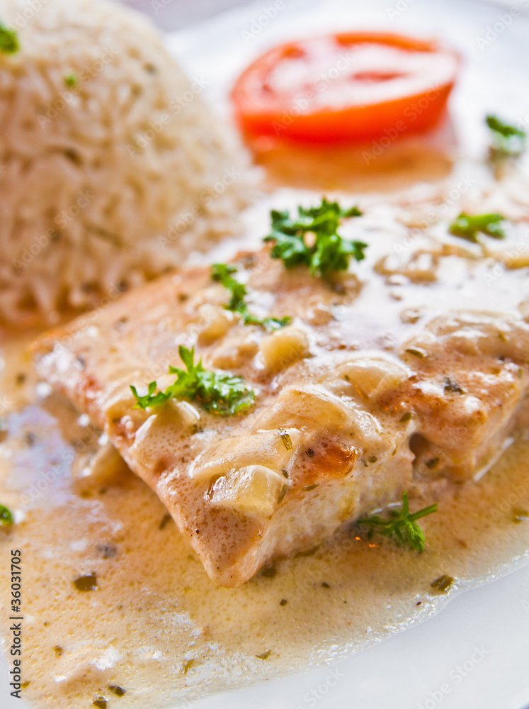 grilled salmon and rice-french cuisine dish with tomato and salm grilled salmon and rice-french cuisine dish with tomato and salm