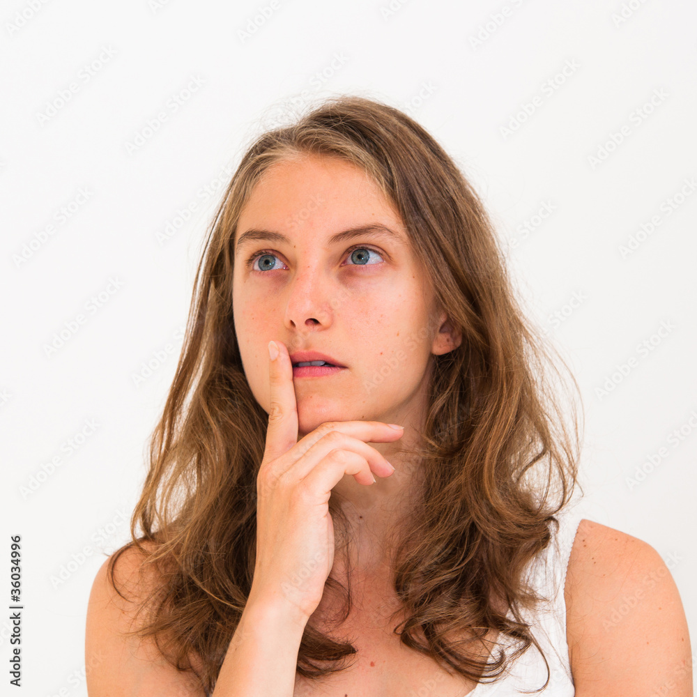 Portrait of a thinking woman looking up Portrait of a thinking woman looking up