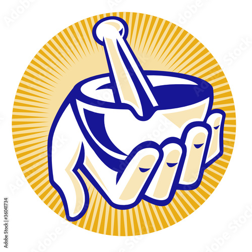 pharmacist hand holding mortar pestle