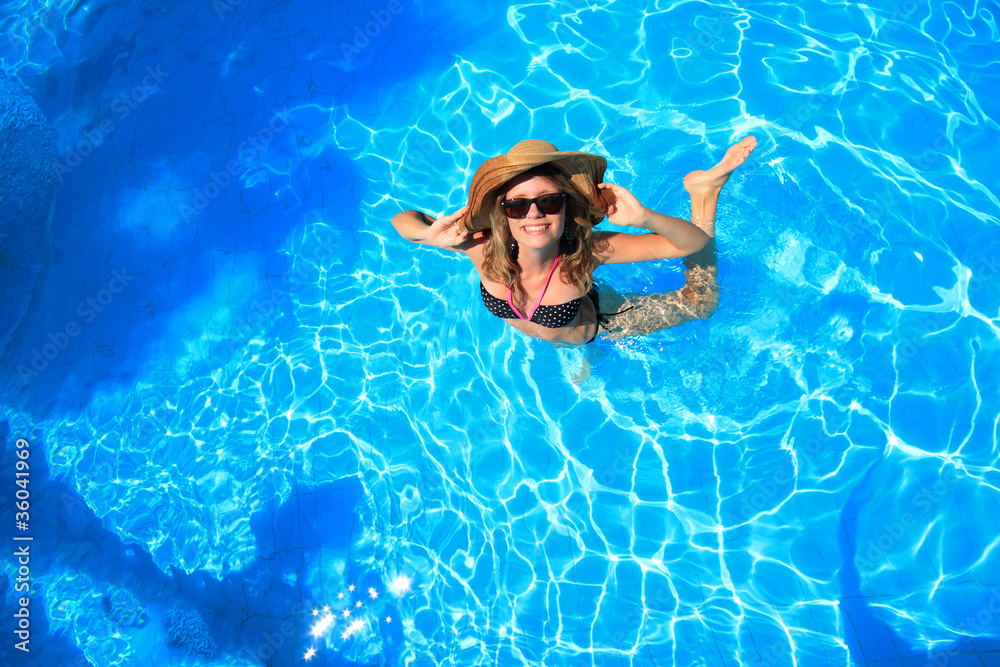 woman in a swimming pool in Greece