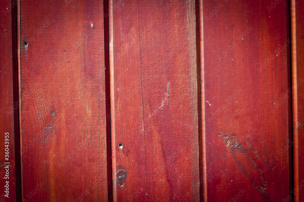 Fototapeta premium Red stained wooden boards