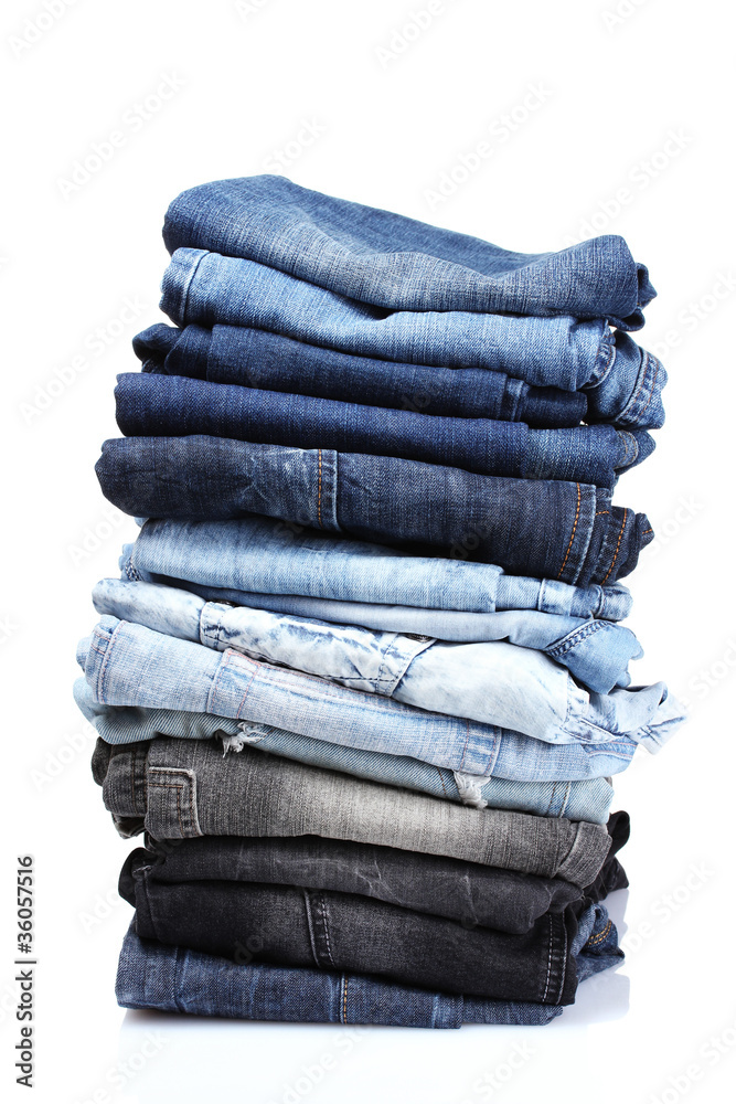 lot of blue jeans isolated on white lot of blue jeans isolated on white