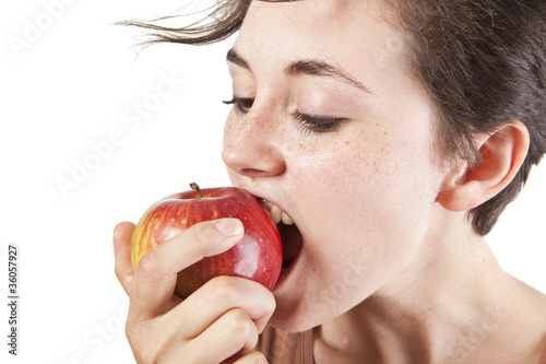 Portrait of beautiful girl with an apple