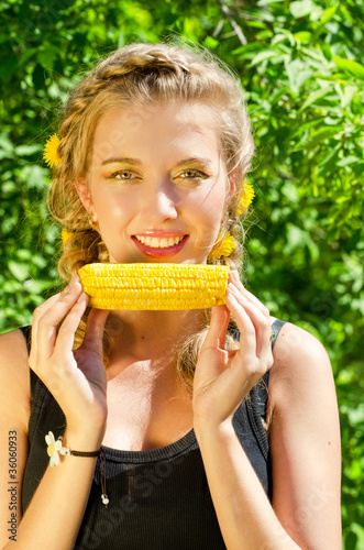 woman eating corn-cob