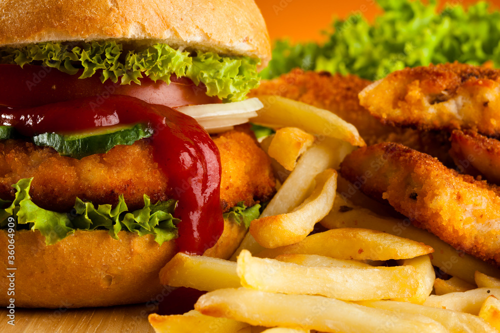 Big hamburger, chicken nuggets and French fries Stock Photo Adobe Stock