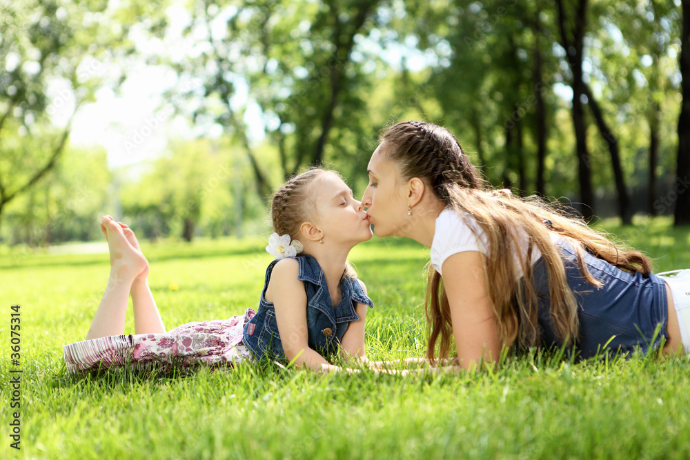 Mother with her daughter outside