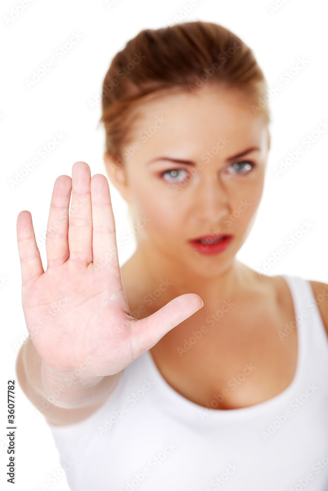 Young girl showing stop gesture. Young girl showing stop gesture.