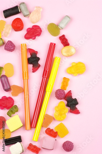 Colorful candy and felt pens