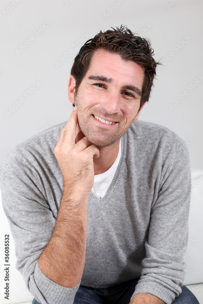 Portrait of handsome guy with hand on chin Portrait of handsome guy with hand on chin