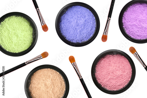 Valokuva colorful cosmetics eyeshadows in box and brushes isolated on whi