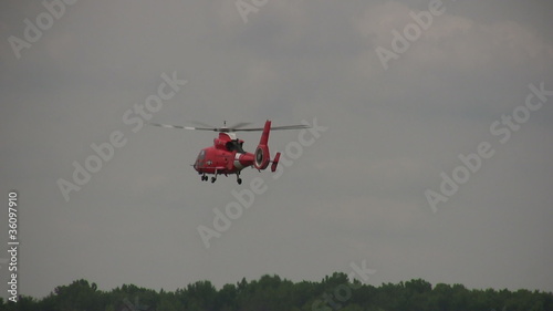 Coast Guard helicopter hovering in one place